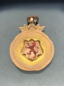 9ct Gold medallion fully hallmarked and decorated with a red rampant Lion and surmounted by a