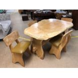 Unusual rustic table and four chairs the top of the table approx 8cm deep and produced from a single