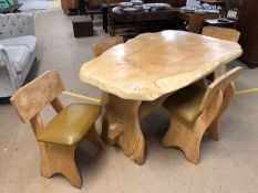 Unusual rustic table and four chairs the top of the table approx 8cm deep and produced from a single