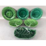 Collection of majolica-style green cabbage leaf plates to include two by Wedgwood Etruria, each