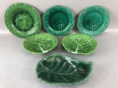 Collection of majolica-style green cabbage leaf plates to include two by Wedgwood Etruria, each