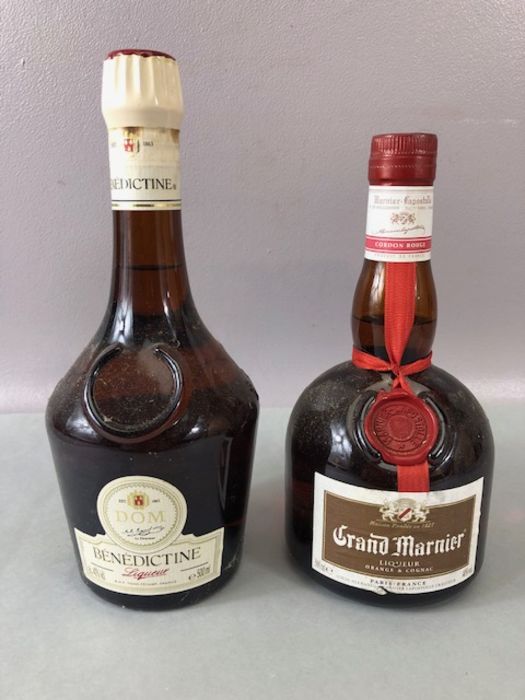 Liqueur two bottles one Benedictine and one Grand Marnier