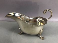 Silver hallmarked sauce boat on three splayed feet hallmarked for Birmingham maker A Chick & Sons