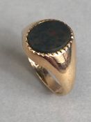 9ct Gold signet ring set with an oval Bloodstone approx size 'L' & 2.4g