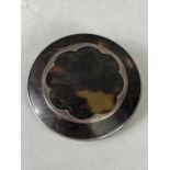 Circular tortoise shell and silver brooch, approx 4.5cm in diameter