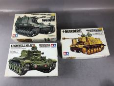 Three TAMIYA unassembled 1:35 scale model tanks: Marder 2, Cromwell Mk IV, Howitzer Wespe