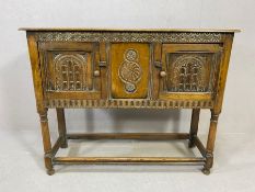 Antique hall or console table with carved detailing and two panelled cupboards, approx 105cm x