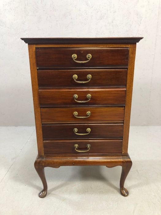 Mahogony music cabinet on queen ann legs with six drawers, approx 86cm tall