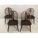 Set of four mid century style stick back chairs (4)