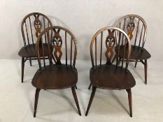 Set of four mid century style stick back chairs (4)