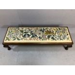 Long low footstool with floral tapestry cushion, approx 120cm x 38cm x 28cm