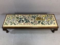 Long low footstool with floral tapestry cushion, approx 120cm x 38cm x 28cm