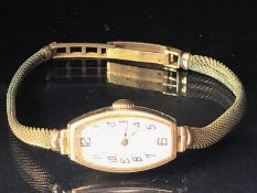 Wristwatch in 9ct Gold case by VERTEX on a gold plated strap total weight approx 16.3g