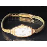 Wristwatch in 9ct Gold case by VERTEX on a gold plated strap total weight approx 16.3g