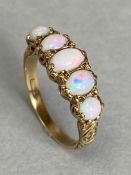 9ct Gold ring set with five graduated Opals in ornate settings size 'N'