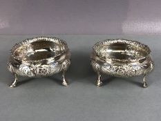 Pair of silver salts (hallmarks rubbed) each approx 6cm in diameter and total weight 110g