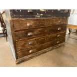 Vintage wooden plan chest with original brass cup handles consisting of four drawers