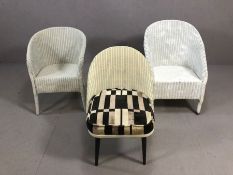 Three Lloyd Loom style chairs, including one retro-style on tapering legs