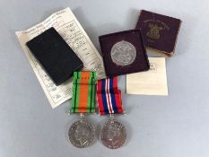 WWII medals in original box: The Defence Medal and The War Medal (unsigned) also with a Boxed