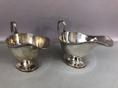 Pair of Mappin & Web Hallmarked large Silver sauce boats with fluted handles, each approx 14cm