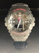 Boxed modern wristwatch G-SHOCK shock resistant watch G-100 with tin and paperwork as new