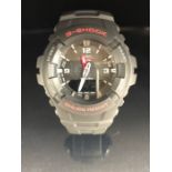 Boxed modern wristwatch G-SHOCK shock resistant watch G-100 with tin and paperwork as new