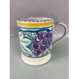 Early Carter Stabler Adams Poole Pottery mug, approx 11cm in height, Grapes design, impressed makers