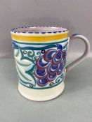 Early Carter Stabler Adams Poole Pottery mug, approx 11cm in height, Grapes design, impressed makers