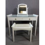 Modern white painted dressing table with glass and rattan top, two drawers and matching stool