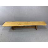 Large low bench / coffee table, the top made from a single plank of wood, approx 212cm x 43cm x 35cm