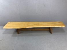 Large low bench / coffee table, the top made from a single plank of wood, approx 212cm x 43cm x 35cm