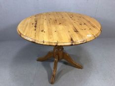 Circular pine dining table approx 105cm in diameter