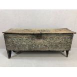 Seventeenth / eighteenth Century coffer with floral carving to front, piecrust detailing to lid,
