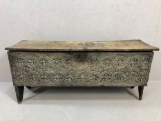 Seventeenth / eighteenth Century coffer with floral carving to front, piecrust detailing to lid,