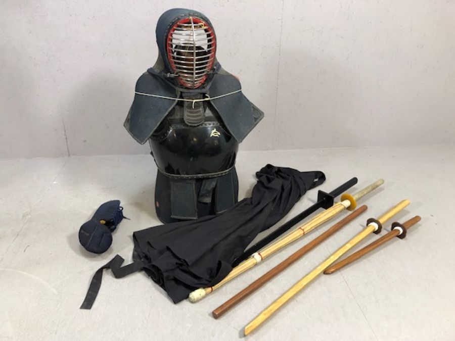 Japanese Kendo Uniform/ suit of armour together with five training sticks or swords
