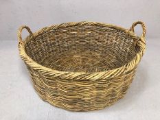 Large French vintage twin-handled basket, approx 70cm in diameter x 27cm in height