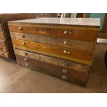 Two sets of three drawer plan chests with perspex top and metal cup handles