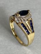 9ct Gold ring in the Art Deco style and set with Blue Gemstones and diamonds size 'N'