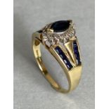 9ct Gold ring in the Art Deco style and set with Blue Gemstones and diamonds size 'N'