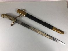 Militaria interest: British naval officers dirk and scabbard. With lion head pommel and mane. With