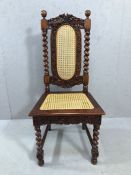 Modern occasional chair with bobbin turned legs and woven seat and back