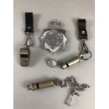 Collection of Police memorabilia to include Metropolitan Police Badge and two whistles, an Acme