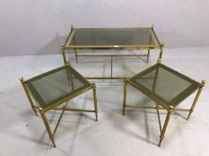 Mid century style metal framed and glass topped coffee table and matching pair of side tables.