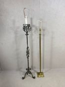 Two metal standard lamps one of corinthian column style