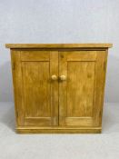 Two door pine unit with bun handles opening to reveal extendable desk and storage, approx 92cm x