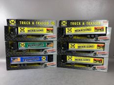 Six toy boxed Truck and trailer lorries