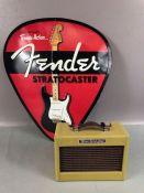 Fender Mini twin amp, approx 17cm x 13cm x 7cm, and a Fender Sratocaster metal sign