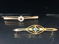 Two 9ct Gold Brooches one set with a blue stone and seed pearls the other set with a faceted