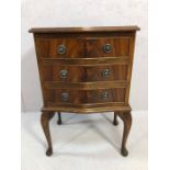 Small serpentine fronted chest of three drawers on queen ann legs, approx 71cm tall