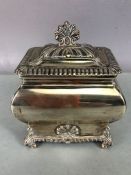 Victorian Silver hallmarked trinket box with hinged lid on scroll feet and with repousse shell